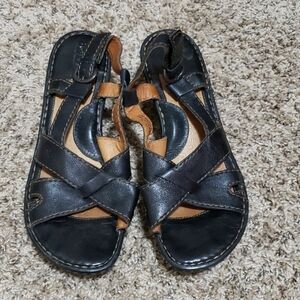 Size 10 black born sandals with brown stitching
